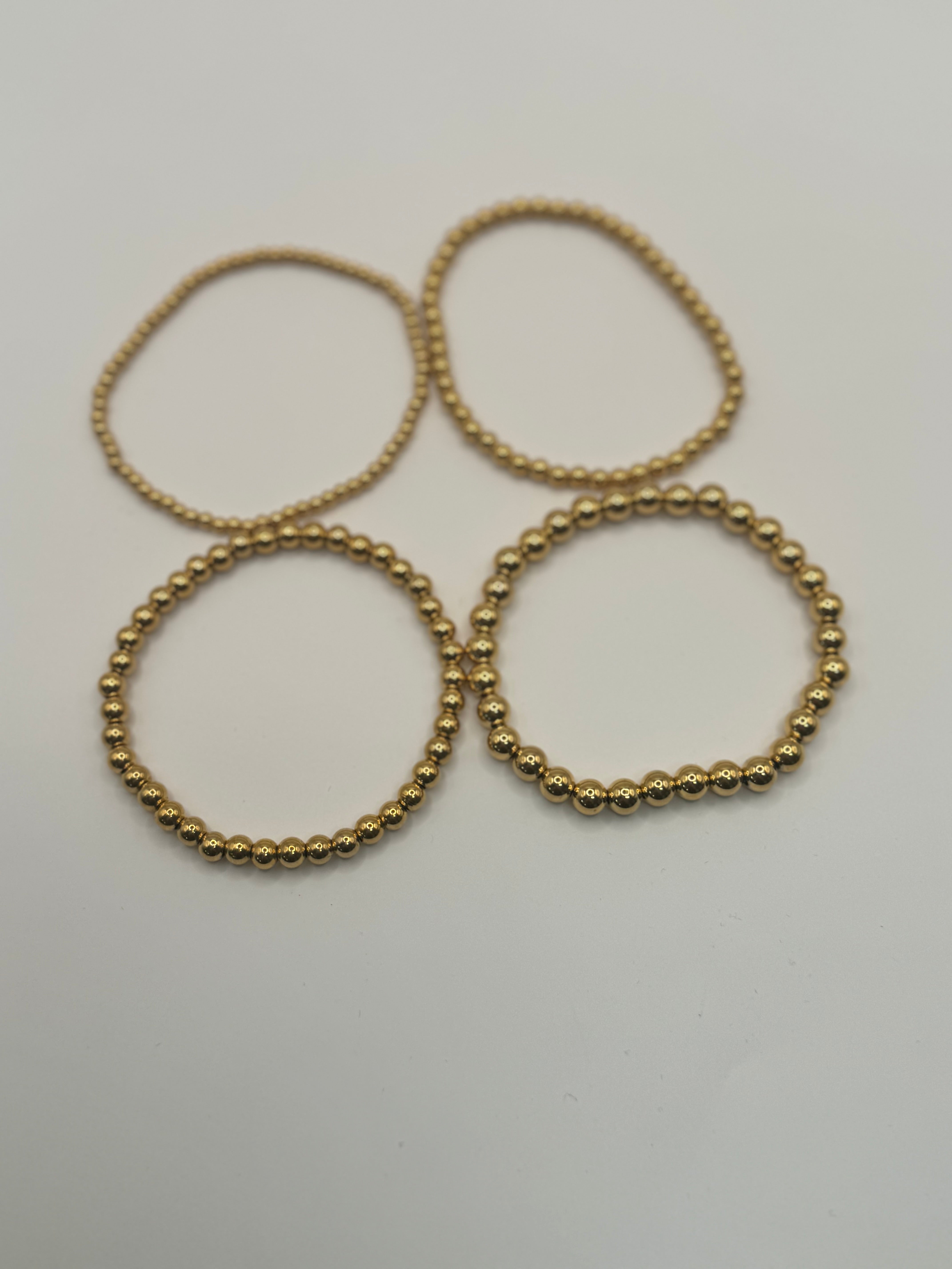 Set of 4 Gold Bead Bracelets
