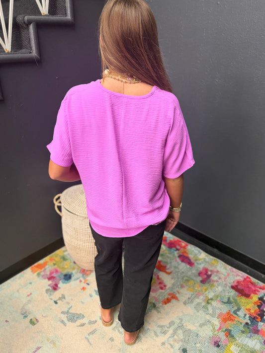 Bright Mauve Woven Airflow V-neck Short Sleeve Top