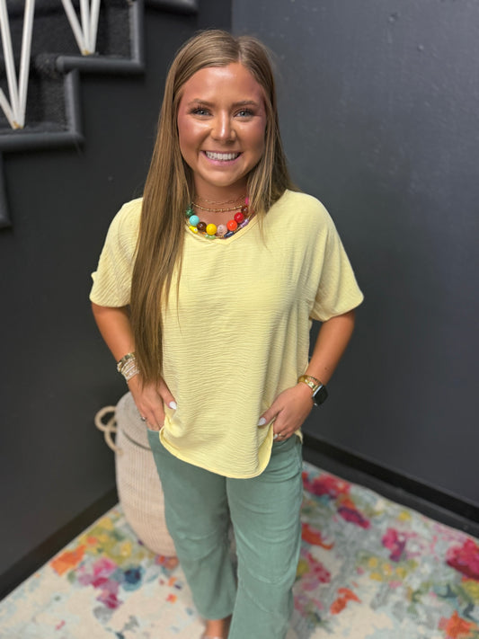 Butter Yellow Woven Airflow V-neck Short Sleeve Top