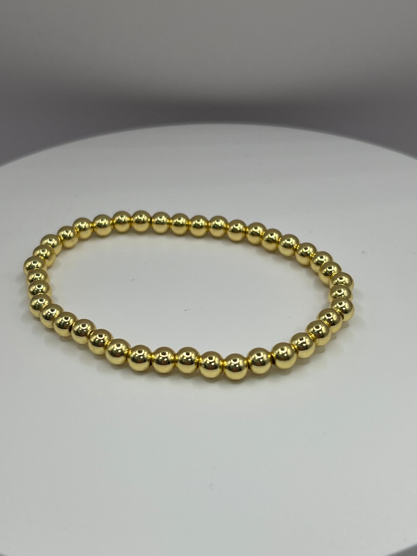 GOLD BEAD BRACELETS