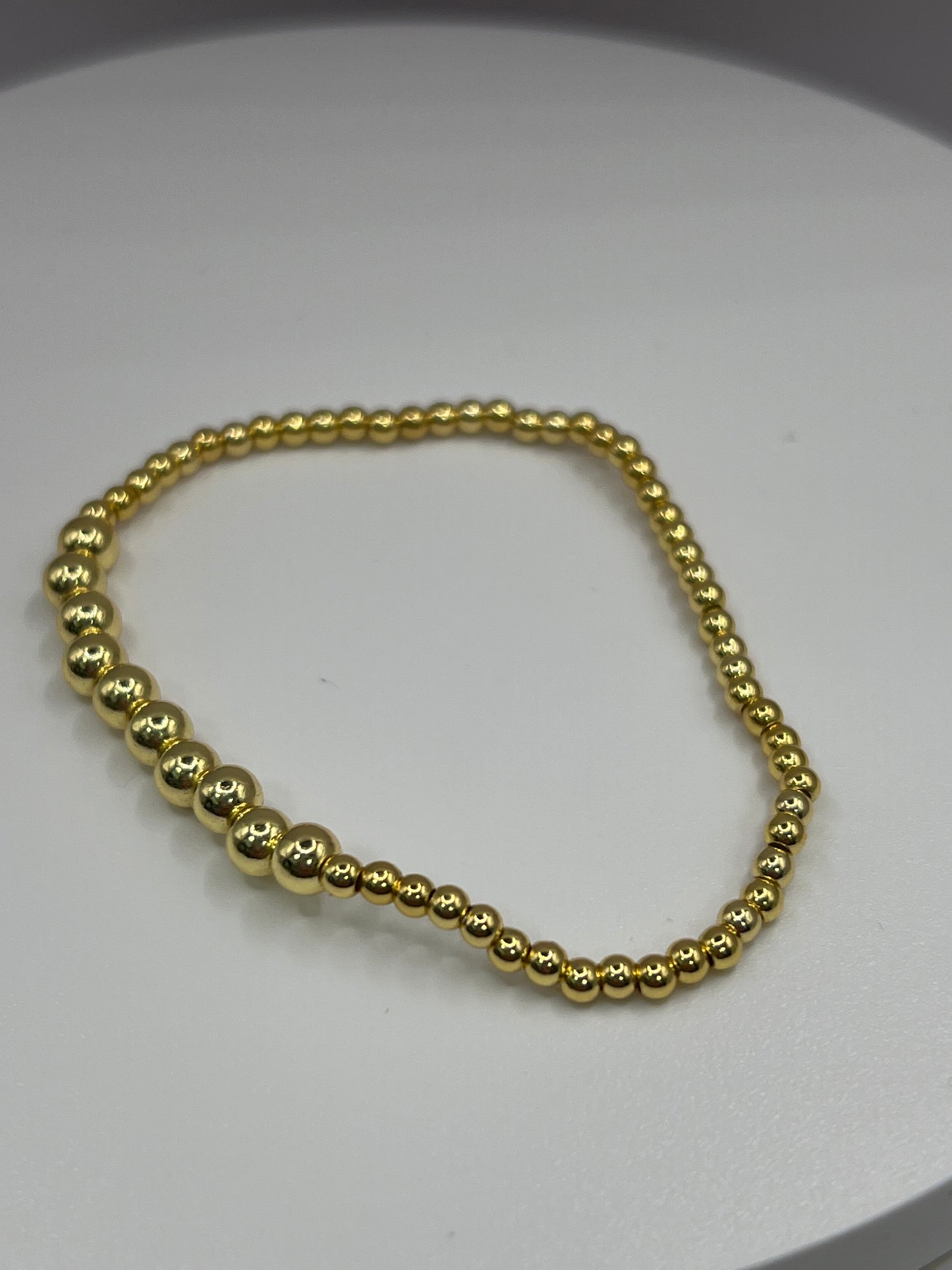 GOLD BEAD BRACELETS