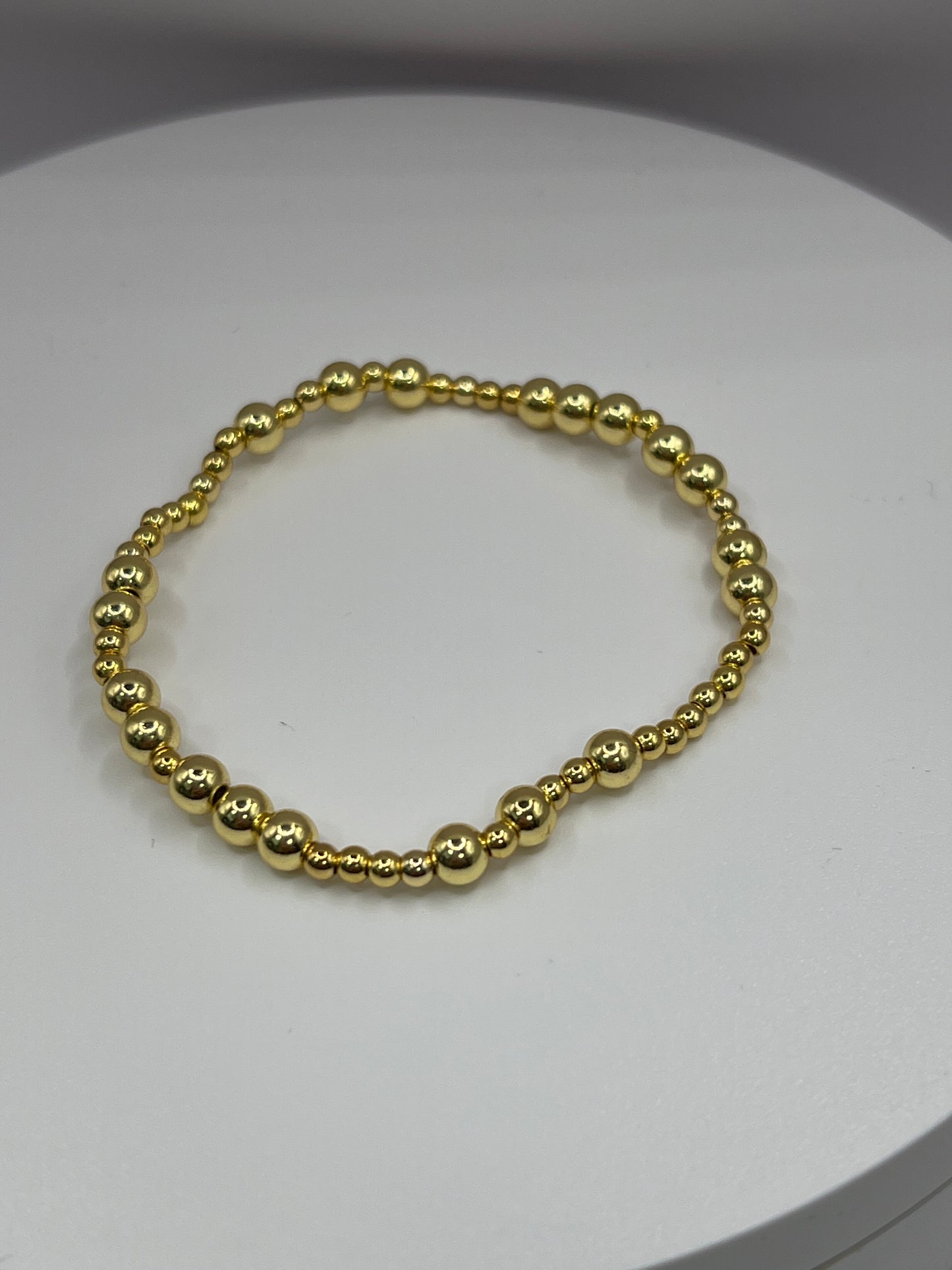 GOLD BEAD BRACELETS