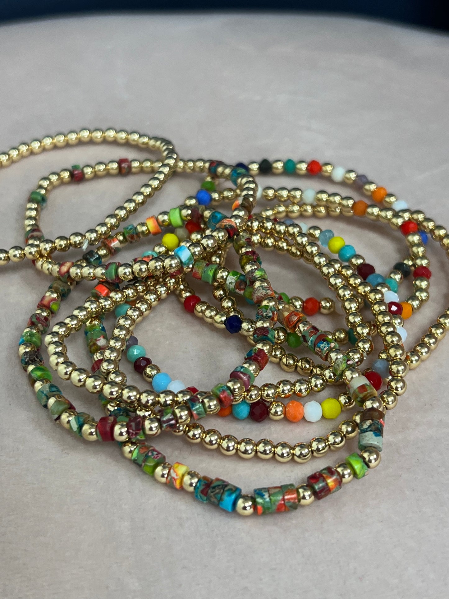 Set of 10 Gold Multi Color Beaded Bracelets