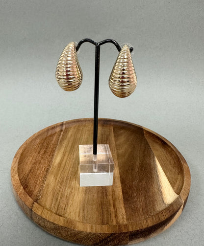 Shell Swirl Studs (Silver and Gold)