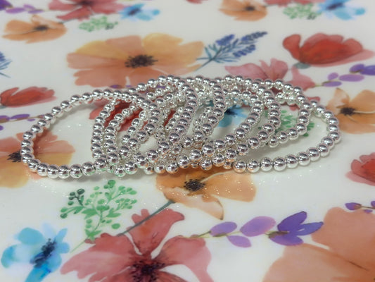 Set of 7 Medium Silver Bead Bracelets