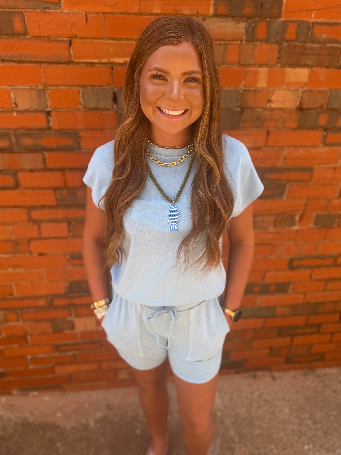 Light Blue Sleeveless Crew Neck Top And Shorts Set