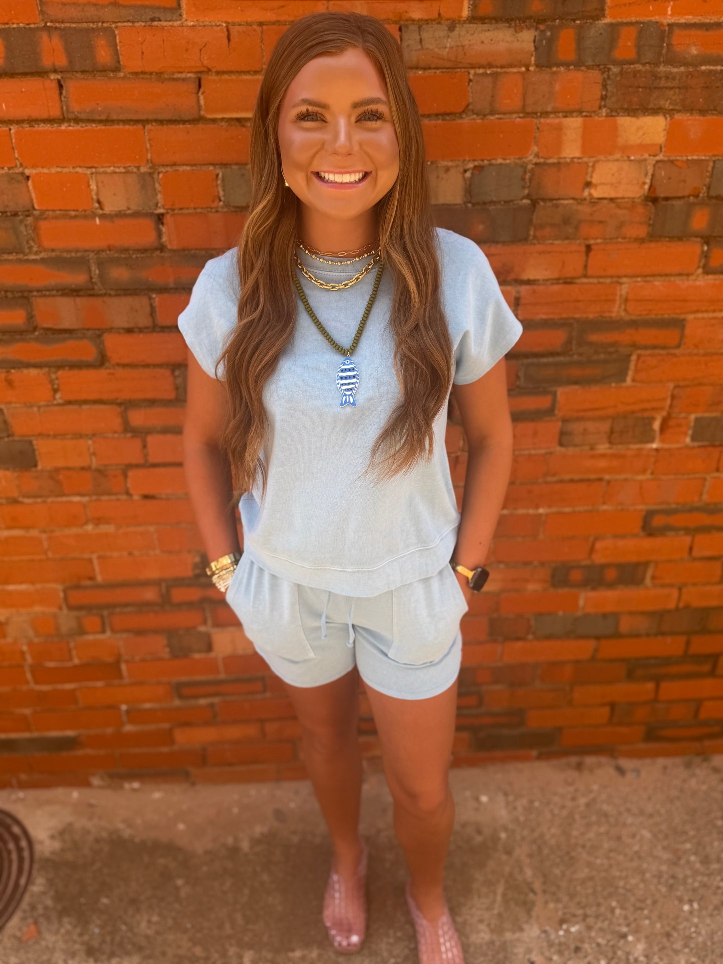 Light Blue Sleeveless Crew Neck Top And Shorts Set