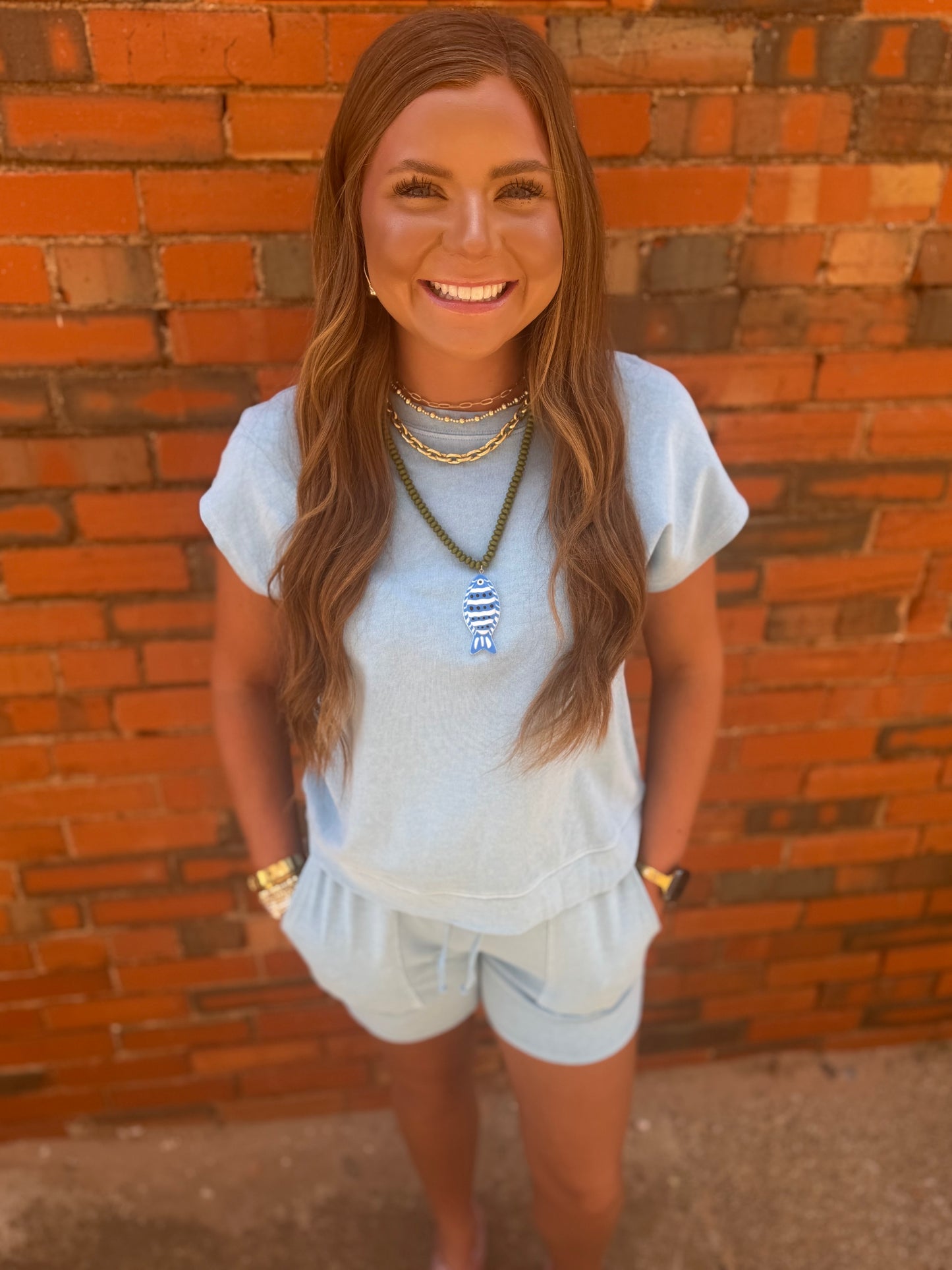 Light Blue Sleeveless Crew Neck Top And Shorts Set