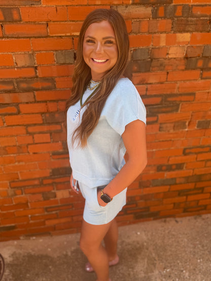 Light Blue Sleeveless Crew Neck Top And Shorts Set